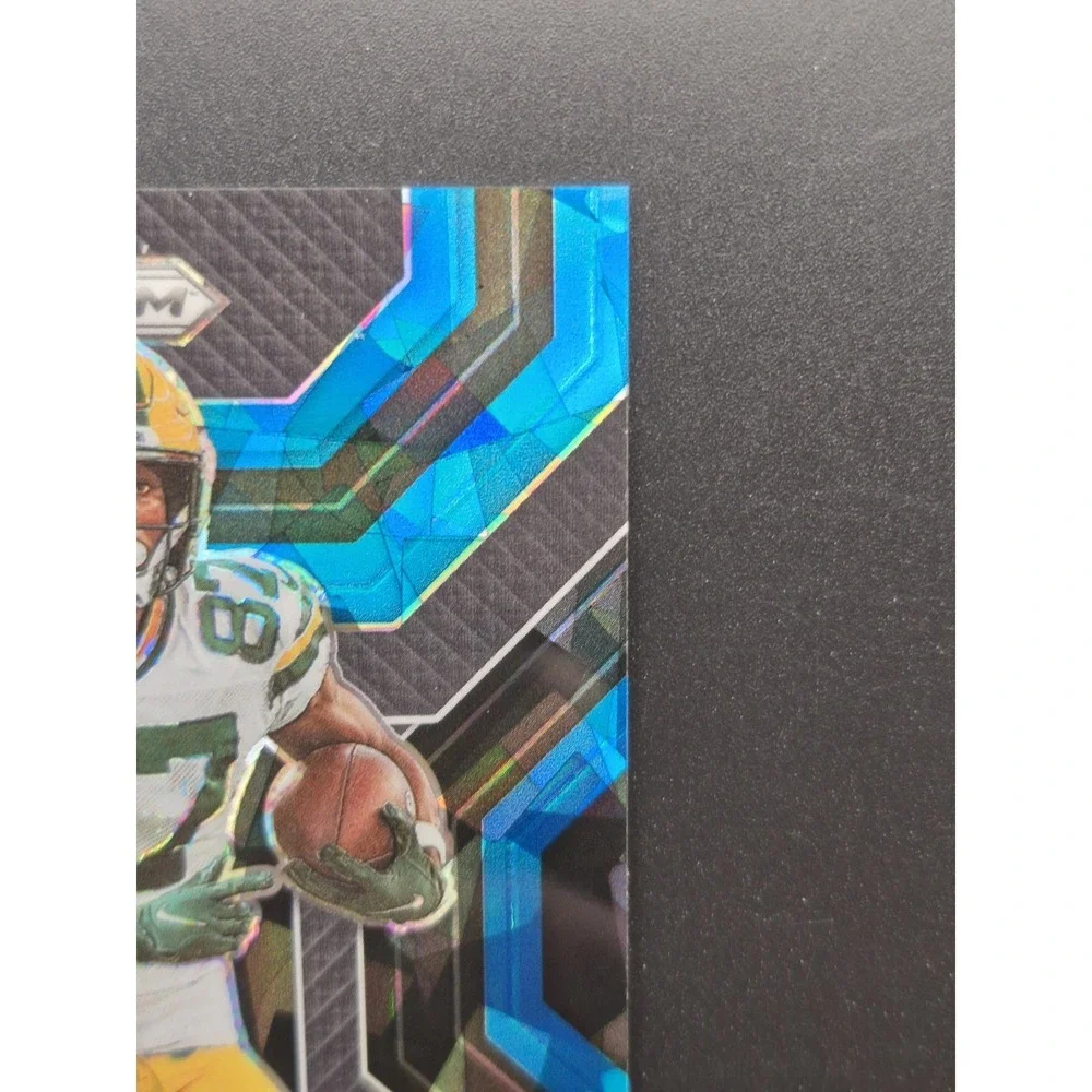 2022‎ Panini Prizm Romeo Doubs #E-14 Emergent Blue Ice Prizm /99 (RC) Packers